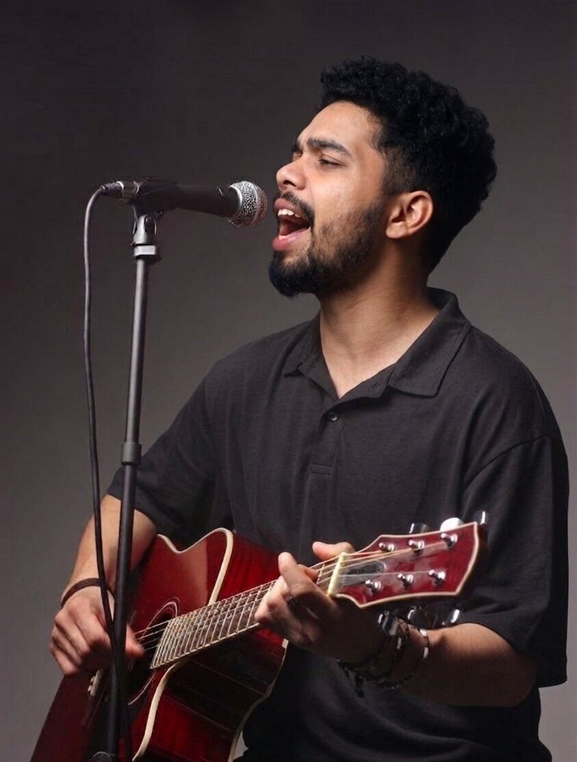 Amey Singing with Guitar